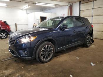  Salvage Mazda Cx