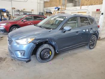  Salvage Mazda Cx